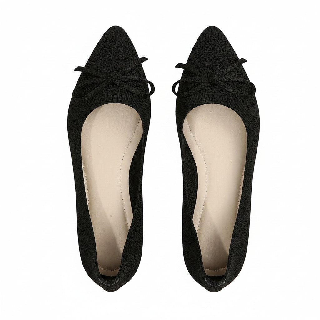 Swiftpick shop black pointed-toe knitted loafers with a delicate bow detail and cushioned beige insoles.