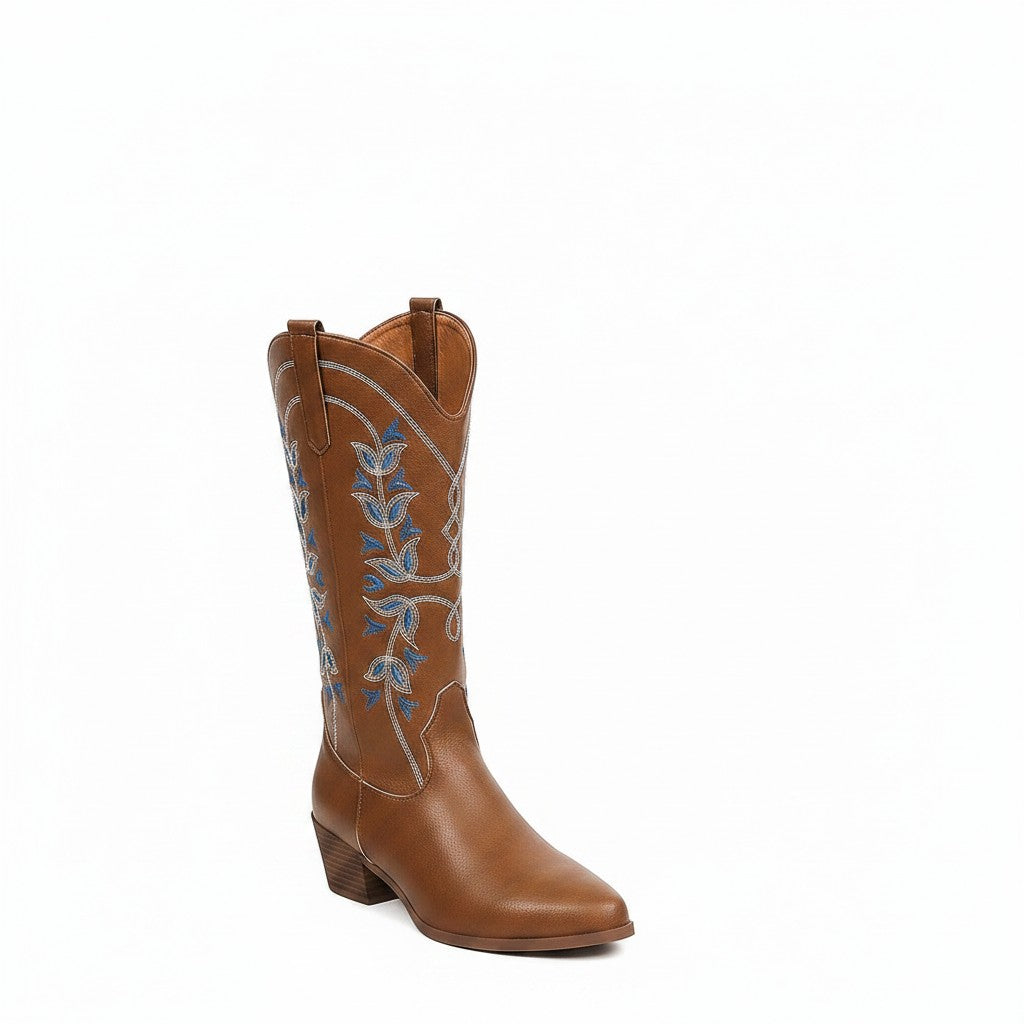 Swiftpick shop tan leatherette Western boots with blue and white floral embroidery, pointed toe, and chunky heel.